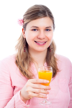 Happy smiling woman holding glass of fresh orange juice, isolated on white background.の写真素材