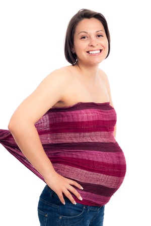 Portrait of happy smiling pregnant woman, isolated on white background.の写真素材