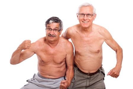 Two happy naked senior men showing body, isolated on white background.の写真素材