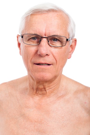 Portrait of elderly man face, isolated on white background.の写真素材