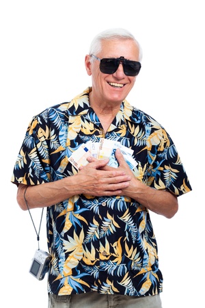 Happy rich senior tourist with money, isolated on white background.の写真素材