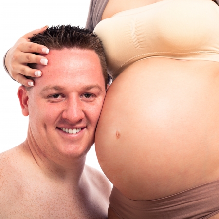 Detail of happy smiling expectant father and pregnant woman, isolated on white background.の写真素材