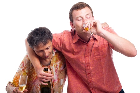 Two drunken men drinking alcohol, isolated on white background.の写真素材