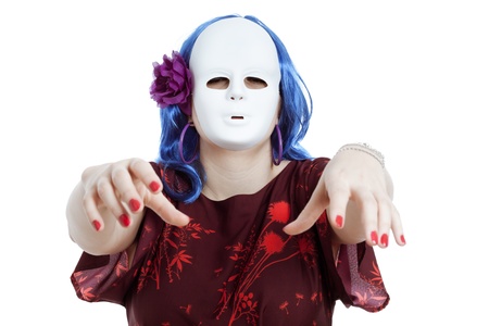 Scary bizarre masked woman, isolated on white background.の写真素材
