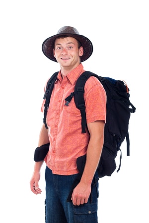 Portrait of young smiling man traveling with backpack, isolated on white background.の写真素材