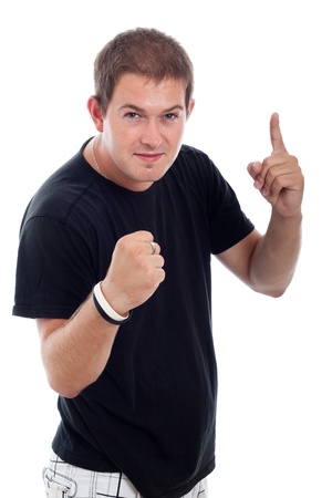 Portrait of young angry man, isolated on white background.の写真素材