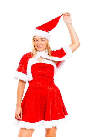 Young attractive blond woman in Santa costume, isolated on white background.の写真素材