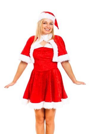 Young attractive blond cute woman posing in Santa costume, isolated on white background.の写真素材