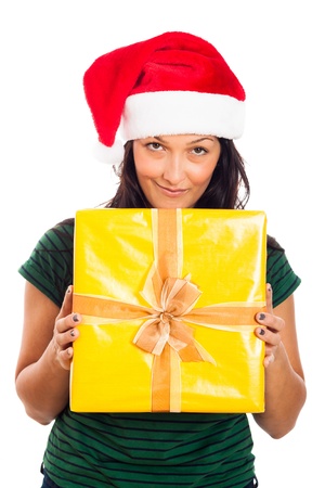 Happy woman in Santa hat with Christmas gift box, isolated on white background.の写真素材