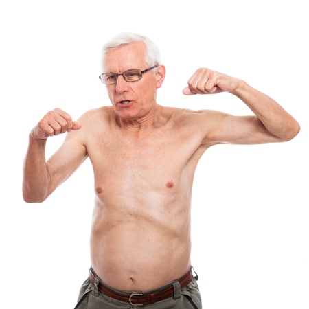 Shirtless senior man gesturing and showing body, isolated on white background.の写真素材
