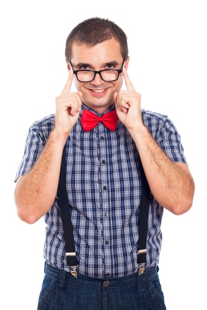 Portrait of happy geek man touching his eyeglasses, isolated on white background.の写真素材