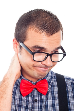 Close up of serious disappointed nerd man looking down, isolated on white background.の写真素材