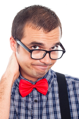 Close up of disappointed nerd man looking at you, isolated on white background.の写真素材