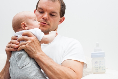 Portrait of a man with baby boy.の写真素材