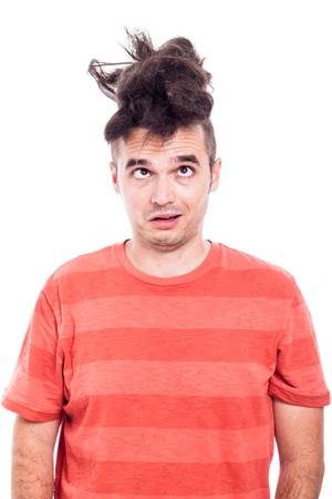 Portrait of funny man with crazy haircut, isolated on white backgroundの写真素材