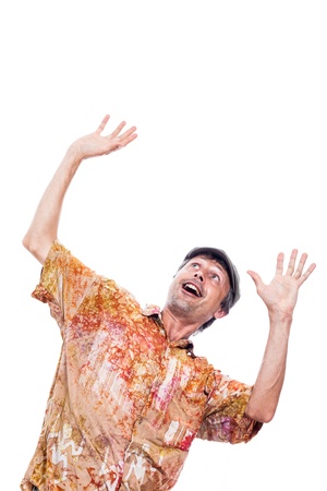 Ecstatic shocked man looking up and gesturing, isolated on white backgroundの写真素材