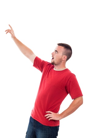 Surprised man looking and pointing up, isolated on white backgroundの写真素材