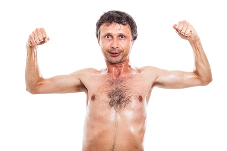 Funny nerd man showing his naked body, isolated on white backgroundの写真素材