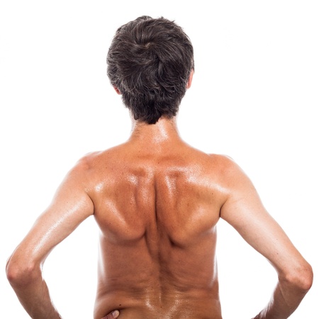 Rear view of shirtless man, isolated on white backgroundの写真素材