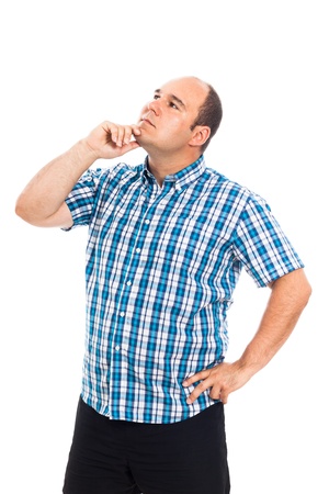 Pensive man looking up, isolated on white backgroundの写真素材