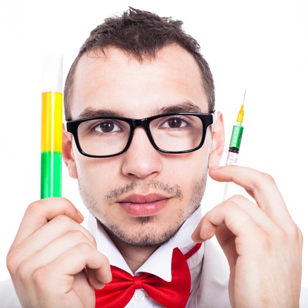 Closeup of scientist holding syringe and test tube, isolated on white backgroundの写真素材