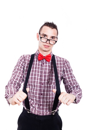 Portrait of nerd man showing his suspenders, isolated on white backgroundの写真素材