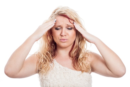 Young blond woman with headache, isolated on white backgroundの写真素材