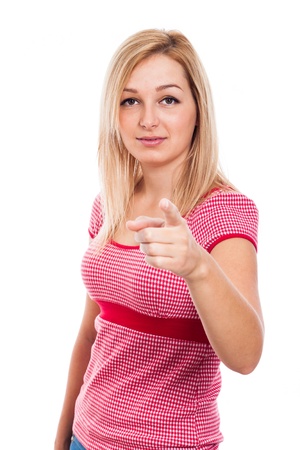 Portrait of woman pointing at you, isolated on white backgroundの写真素材