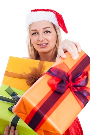Generous Christmas woman giving presents, isolated on white background.の写真素材