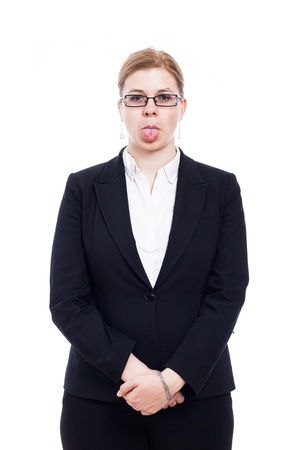 Portrait of businesswoman sticking out tongue, isolated on white background.の写真素材