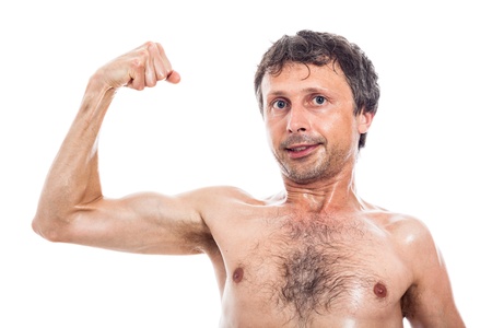 Slim shirtless man showing his biceps, isolated on white backgroundの写真素材