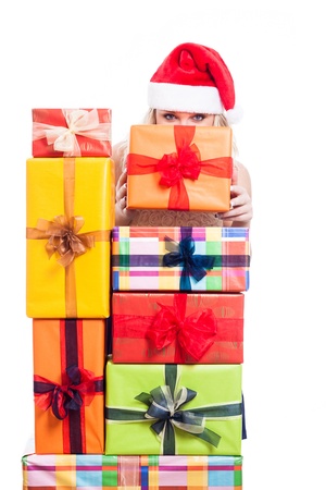Secret Christmas woman with many presents, isolated on white background.の写真素材