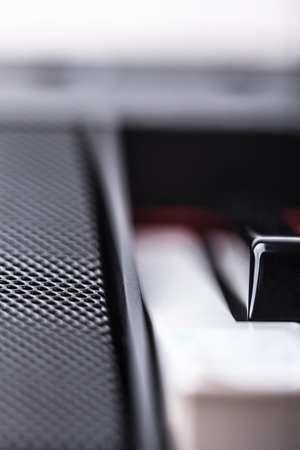 Detail of digital piano speaker and keyboard.の写真素材