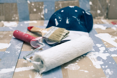 Closeup of painting tools and cap の写真素材