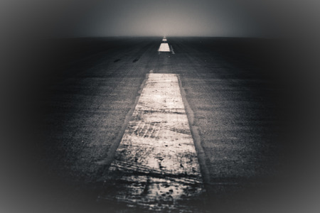 Abstract creative photo of dramatic dark road and sky の写真素材