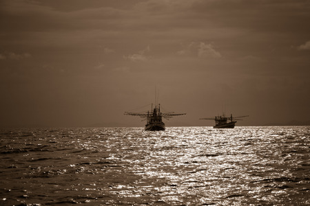 Two fishing boats and beautiful landscape in Andaman Sea, Phi Phi Island, Thailand の写真素材