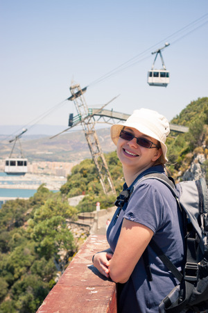 Happy young woman tourist on the Rock of Gibraltar.の写真素材