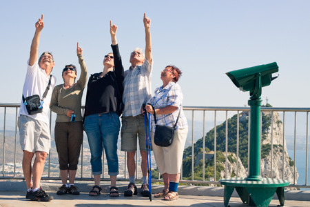 Portrait of happy excited tourists people on the Rock of Gibraltar.の写真素材