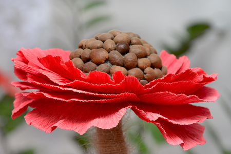 turquoise fabric flower isolated on a white backgroundの写真素材