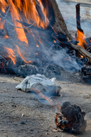 Slavic holiday end of winter. A large terry doll of straw is burning. Black smoke is visibleの写真素材