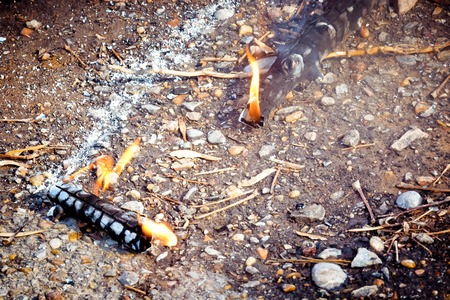 Slavic holiday end of winter. A large terry doll of straw is burning. Black smoke is visibleの写真素材