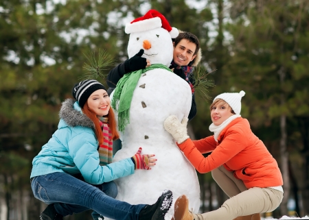 friends in the snow in winterの写真素材