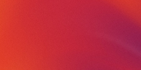 Vibrant red gradient isolated on grainy background