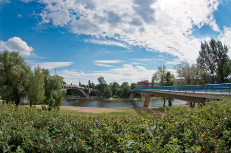 Fish-eye panorama photo of two bridges over the Vltava river