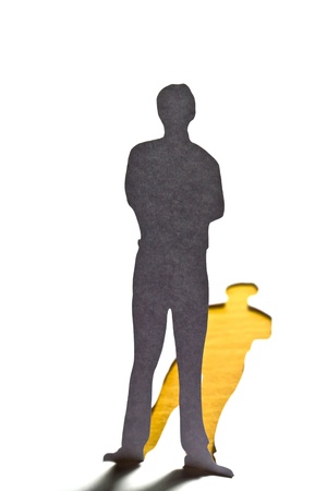 Close up of people cut out of paper on tableの写真素材