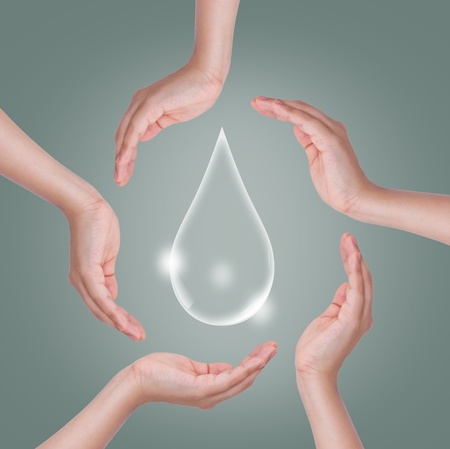 Eco concept : Hand hold water dropの写真素材