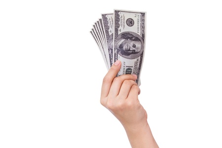 Hands holding dollars isolated on white backgroundの写真素材