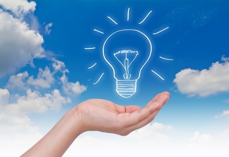 women hand with lamp bulbの写真素材