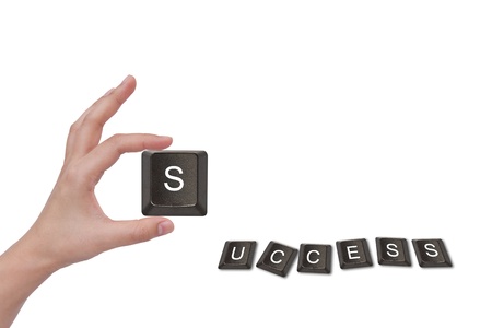 Word Success and female hand, business concept, isolated on white backgroundの写真素材