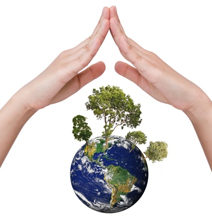 Eco concept : Earth in hands isolated on whiteの写真素材